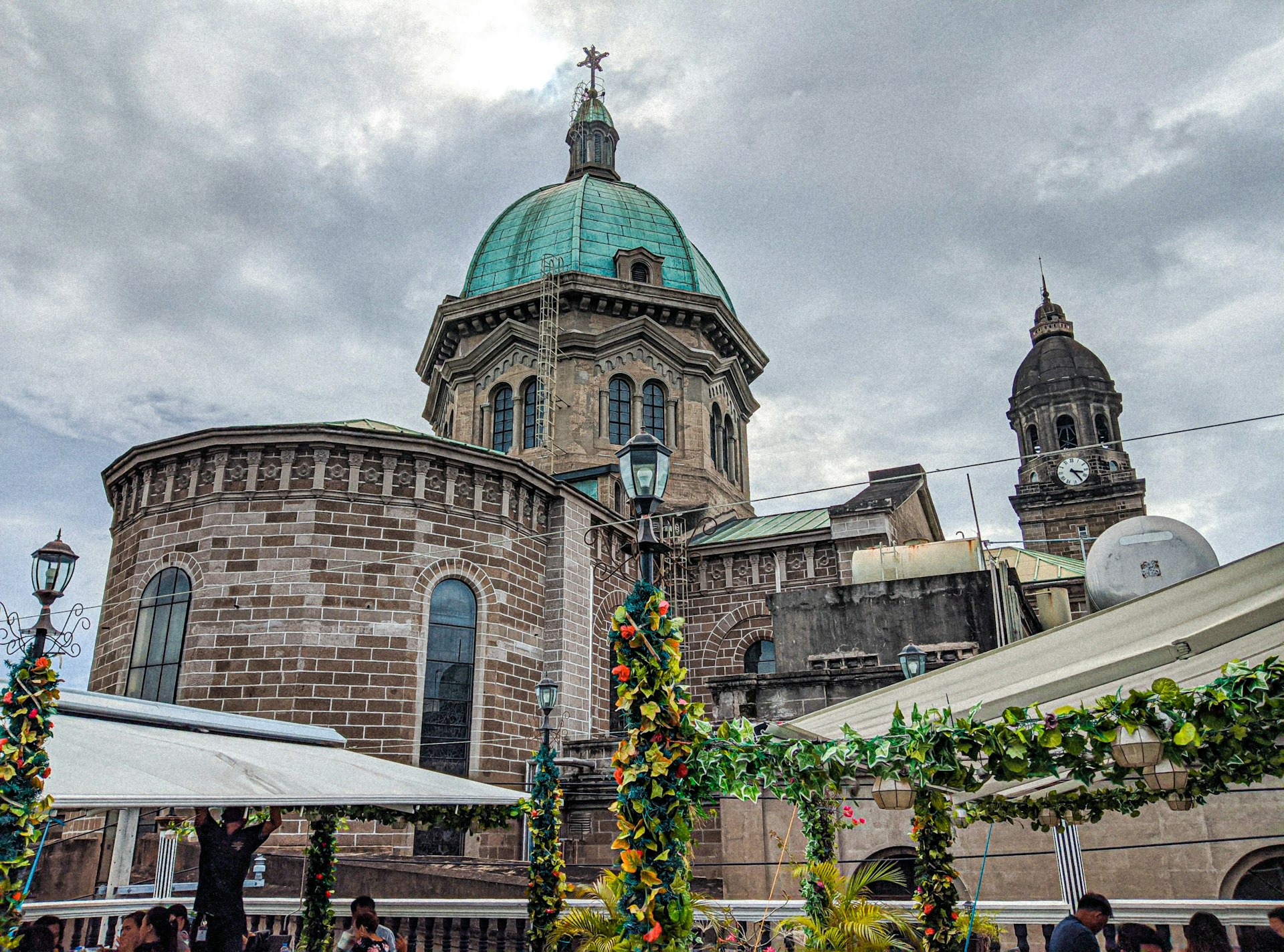 a large building with a green dome on top of it